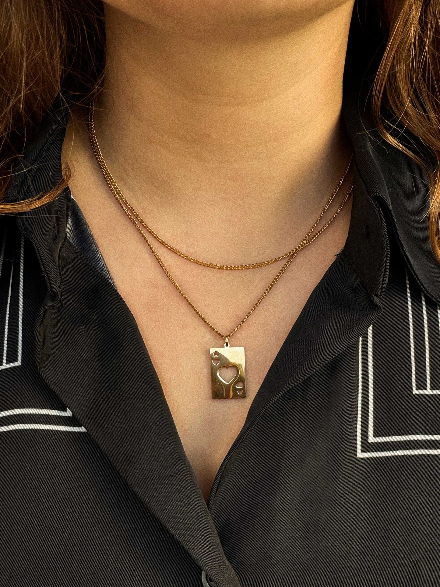 Gouden ketting met bedel harten aas speelkaart