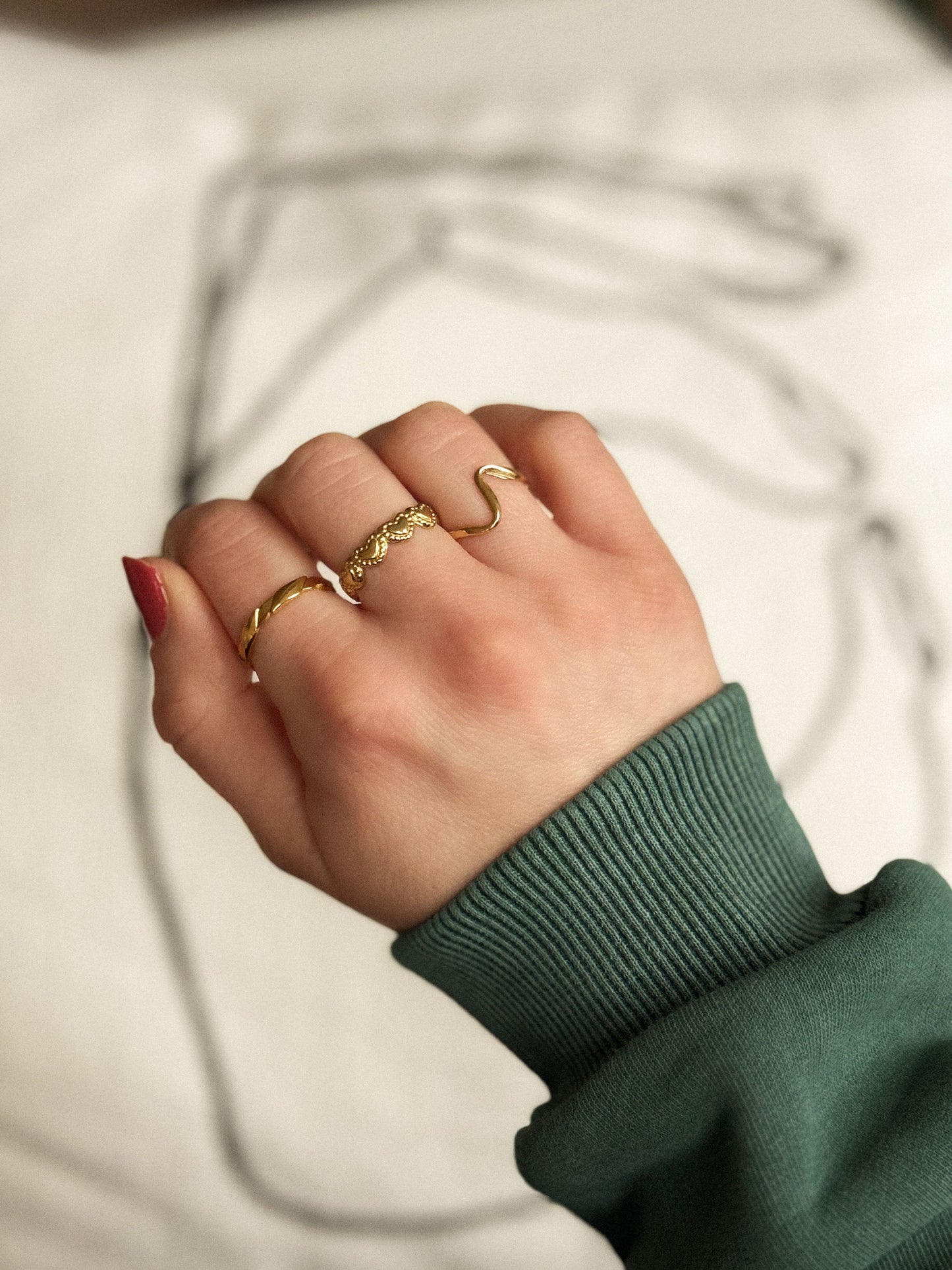 Gouden ring met hartjes verstelbaar