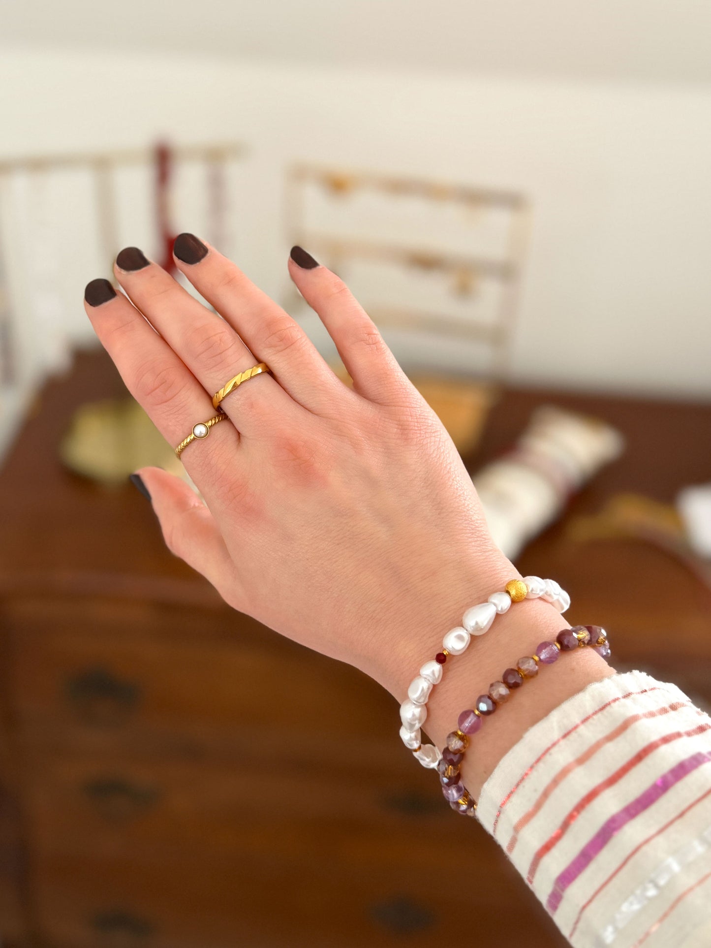 Paarse armband met facetkralen