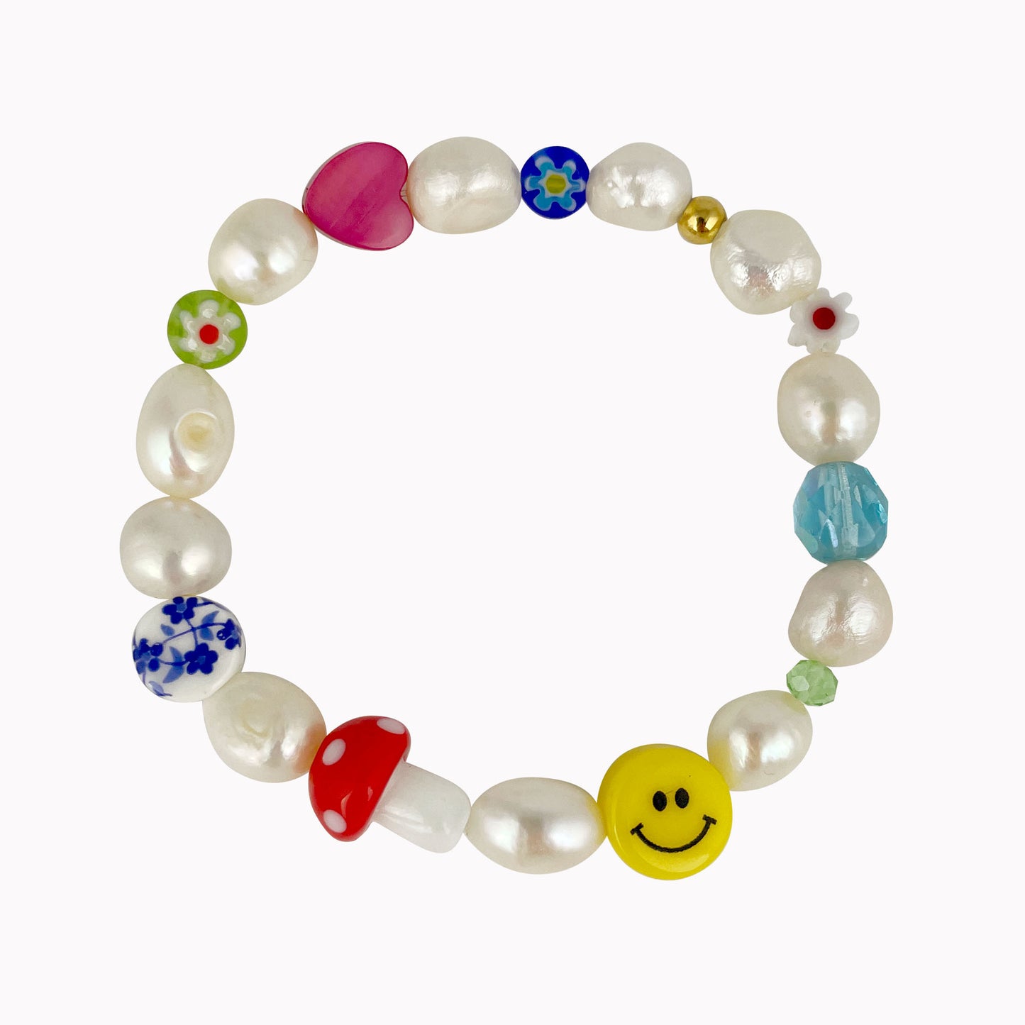 Statement armband met parels, smiley, paddenstoel en opvallende kralen