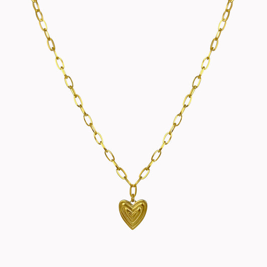 Gouden schakelketting met groot hart