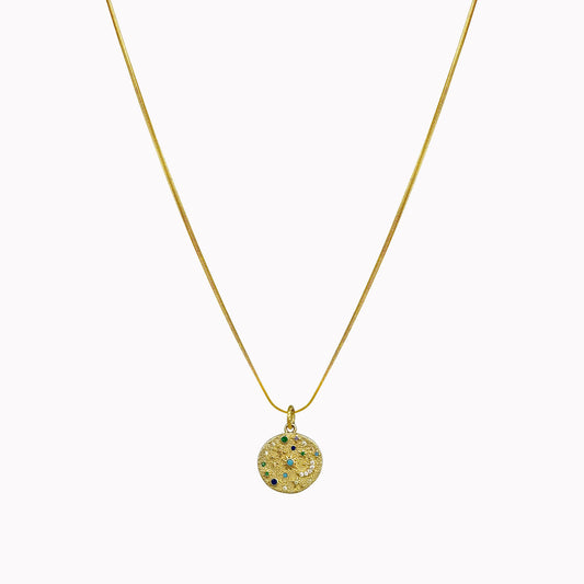 Gouden snake ketting met ronde maan en sterren bedel