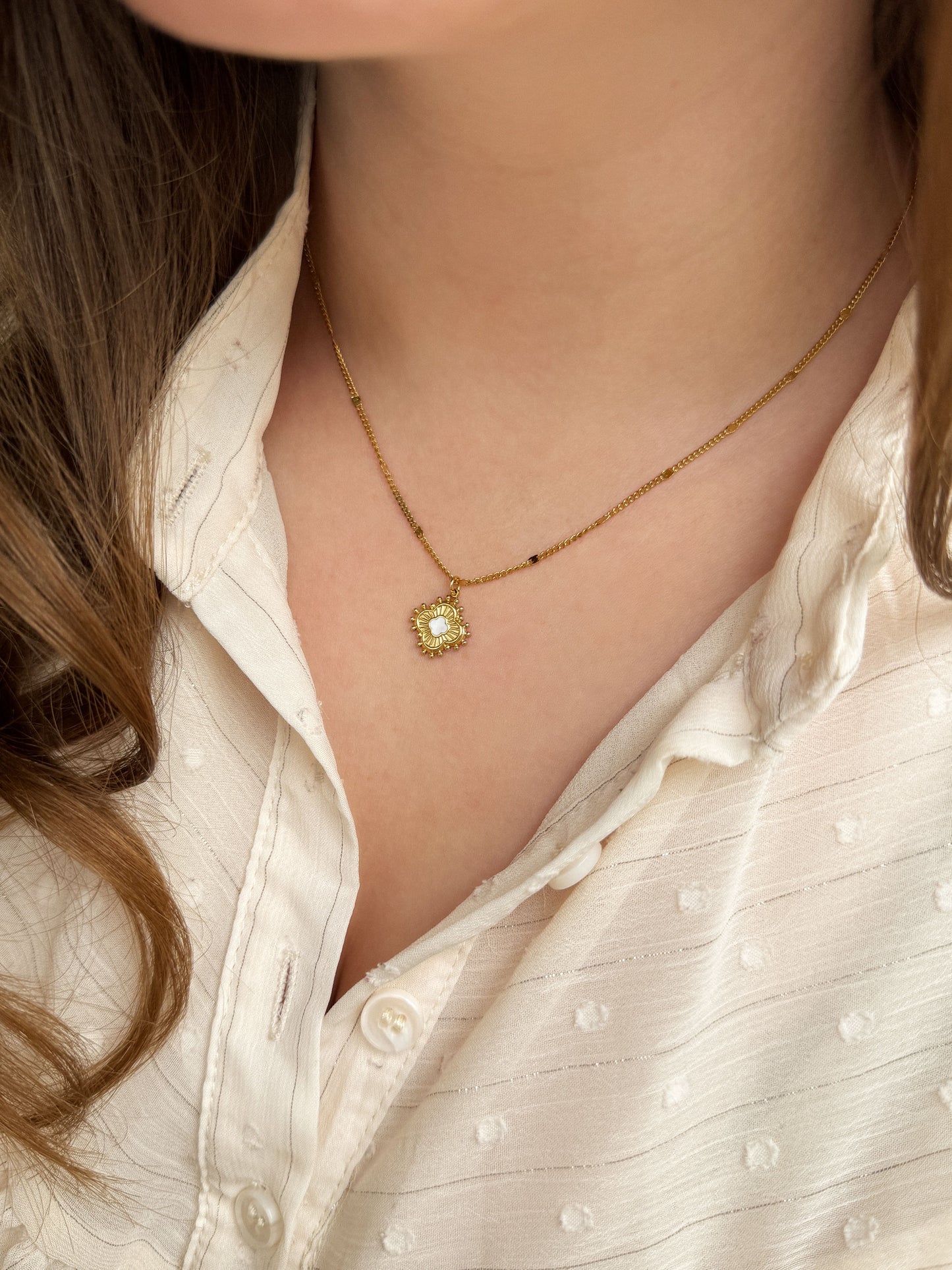 Schakelketting klavertje vier goudkleurig