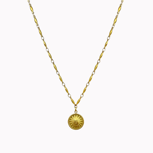 Gouden ketting langwerpige schakels en zon bedel