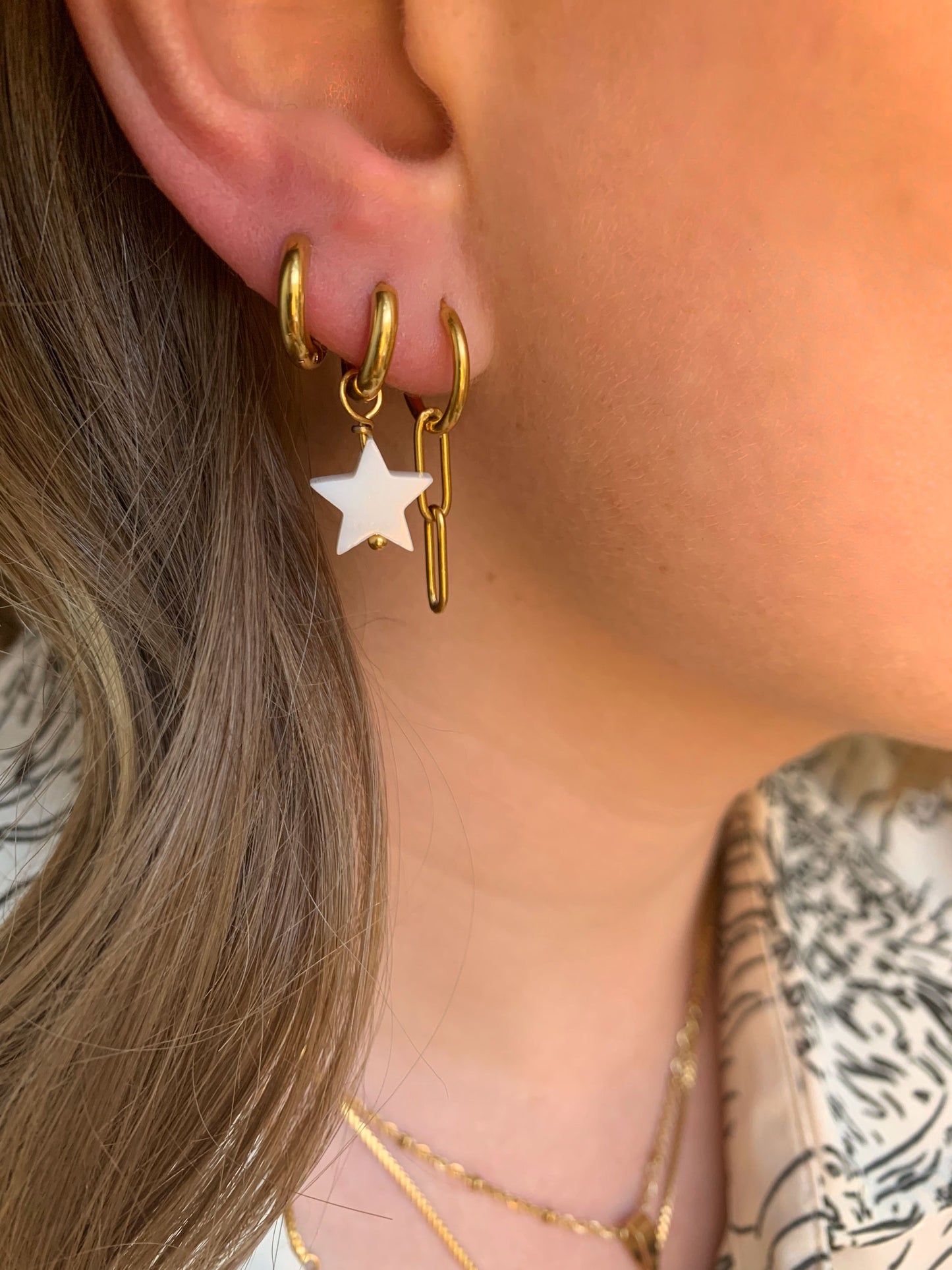 Oorbellen Shell Star Goud