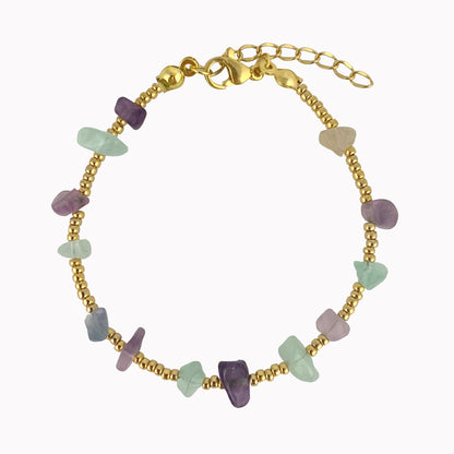 Gouden armband met groene steentjes