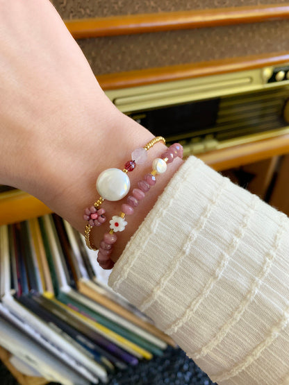 Paarse kralen armband met bloem