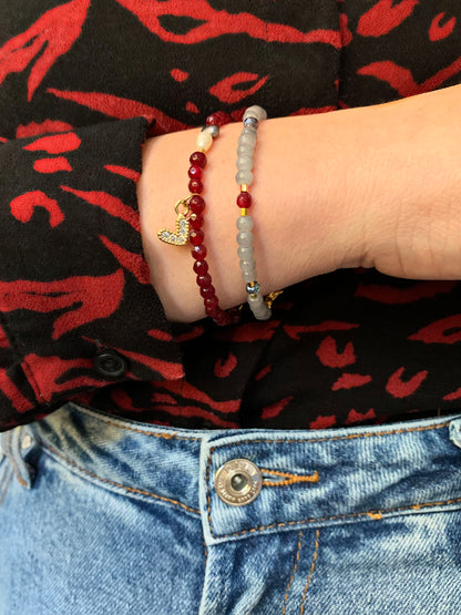Grijze kralen armband met steentjes