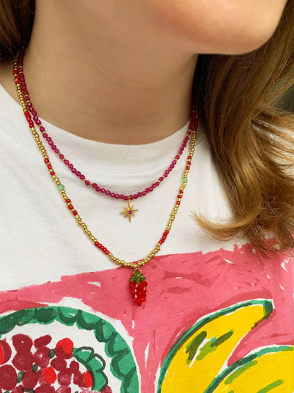 Roze kralen ketting met ster bedel