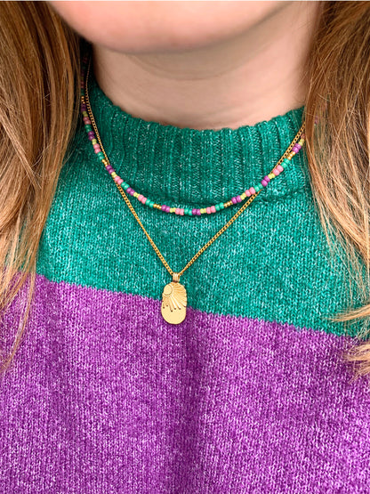 Ketting met paarse en groene kralen