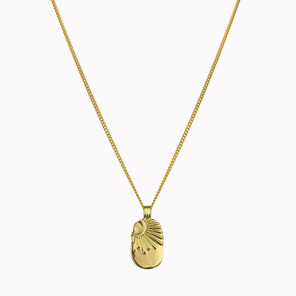 Gouden schakelketting met bedel zon