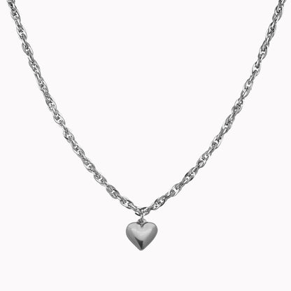 Zilveren schakelketting met hartje