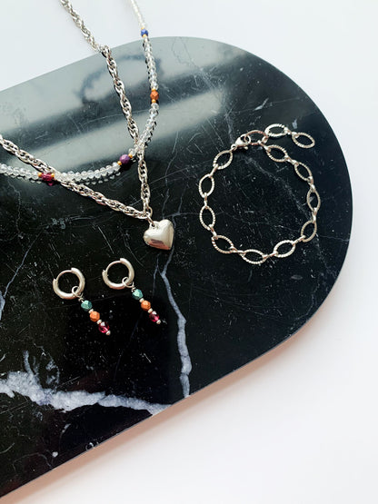 Zilveren schakelketting met hartje