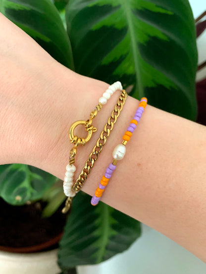 Paars oranje armband met parel