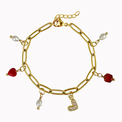 Bedel armband met parels, hartje en rode steentjes