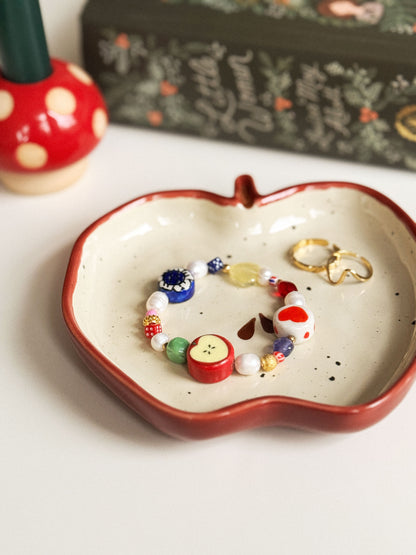 Statement armband met opvallende kralen appel hartje bloem