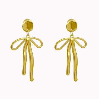 Statement oorbellen met strik goud