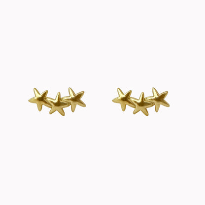 Gouden oor studs met drie sterretjes