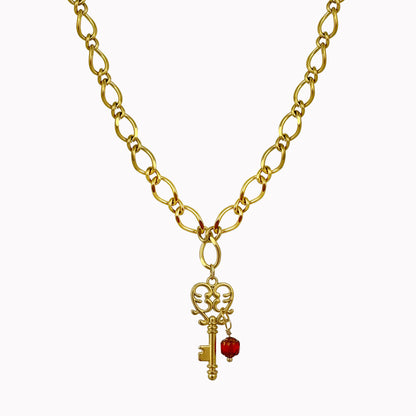 Gouden schakel ketting met bedel sleutel