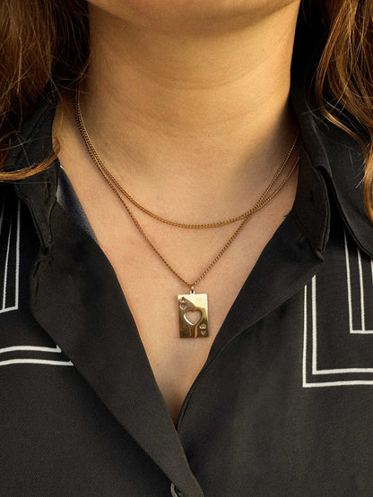 Gouden ketting met bedel harten aas speelkaart