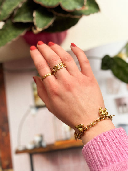 Gouden ring met open hartjes
