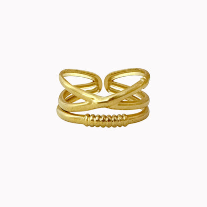 Dubbele gouden ring gekruist