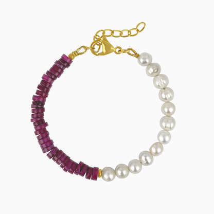 Parelarmband met paarse schelpkralen