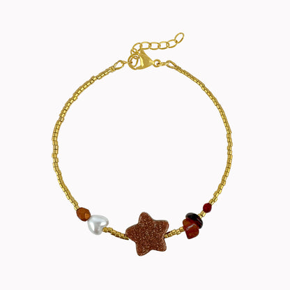 Gouden kralenarmband met bruine sterbedel