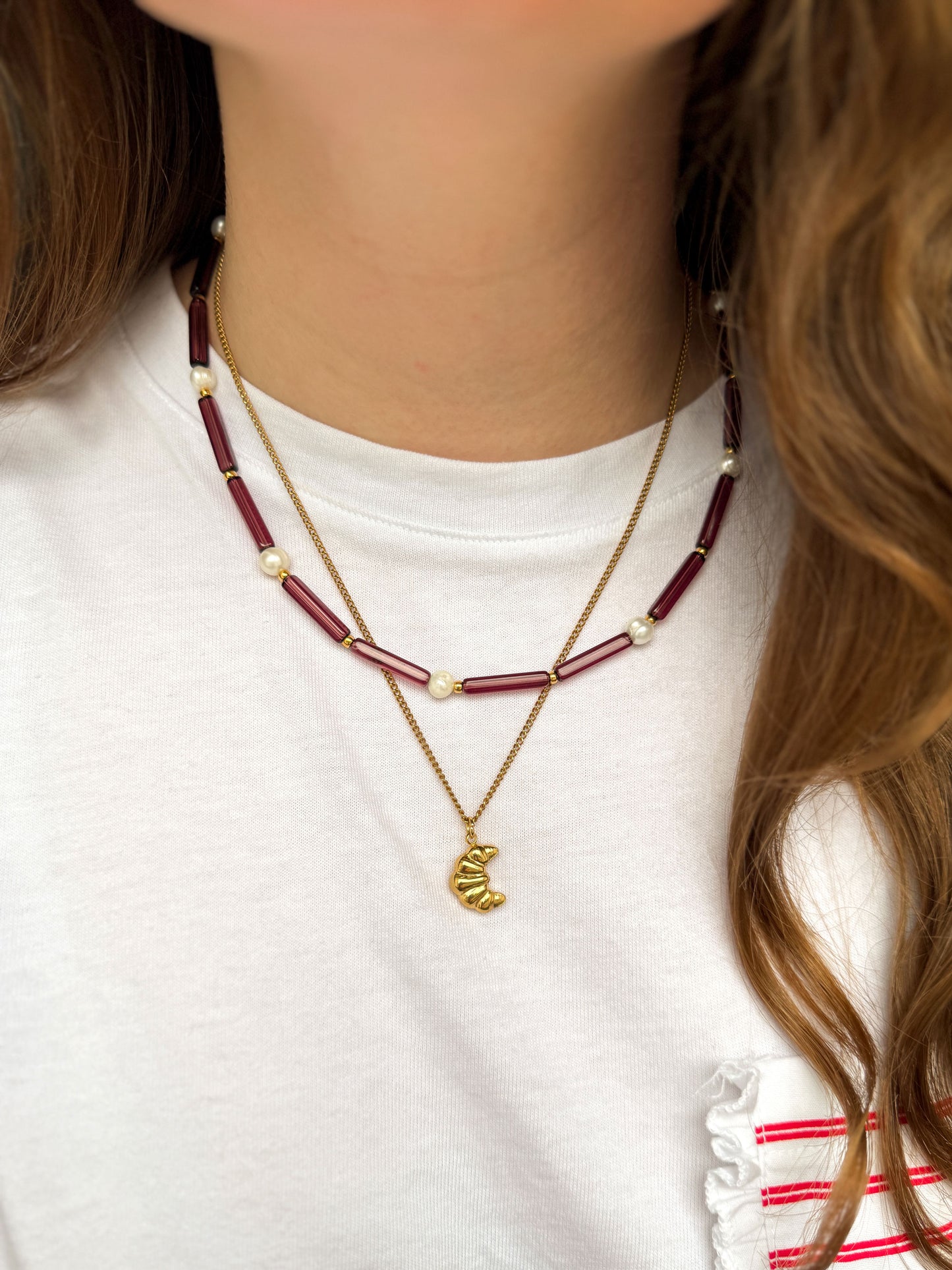 Gouden ketting met croissant bedel