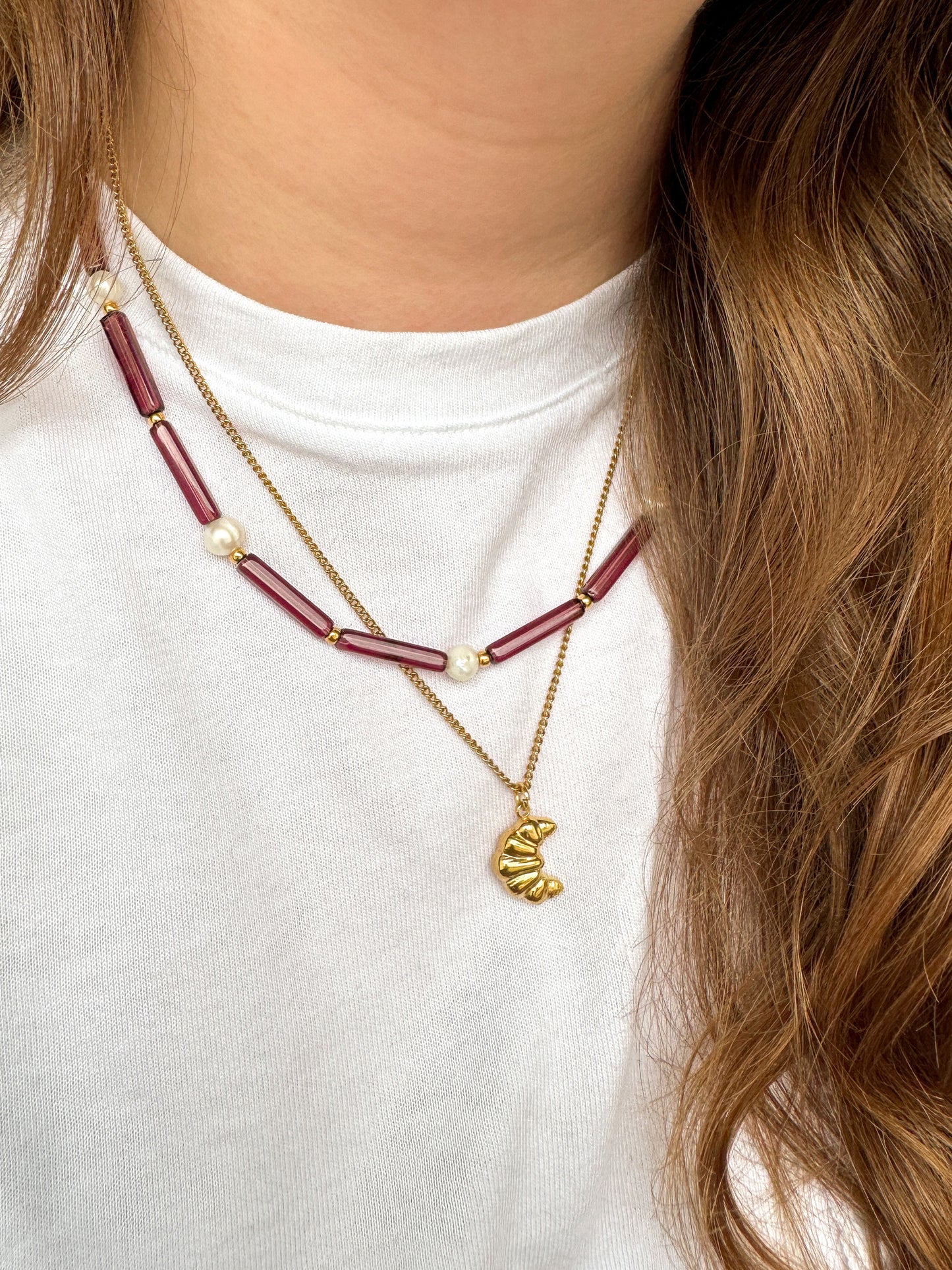 Gouden bedelketting met croissant hanger