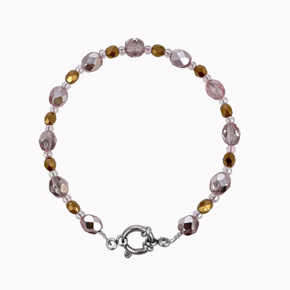 Armband met metallic roze kralen en slotje