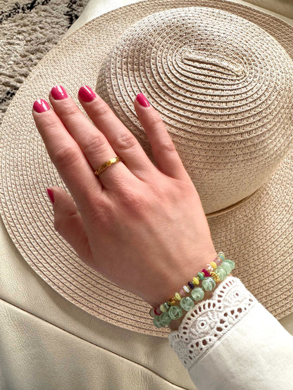 Groene armband met platte kralen