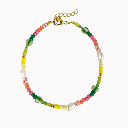 Tropische kralen armband met parels en gestreepte kralen roze groen geel