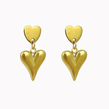 Gouden oorbellen met twee hartjes