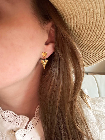 Gouden oorbellen met twee hartjes