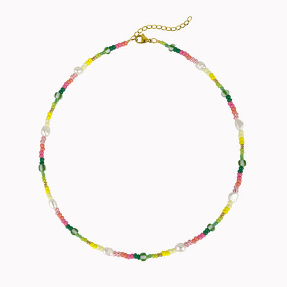 Tropische kralen ketting met parels en gestreepte kralen roze groen geel