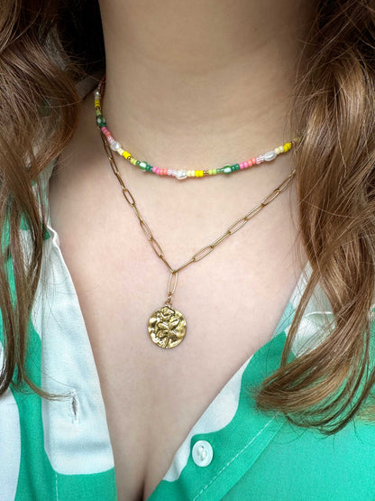 Tropische kralen ketting met parels en gestreepte kralen roze groen geel