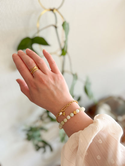 Groene kralen armband met klaver en schakelketting met parel en ster