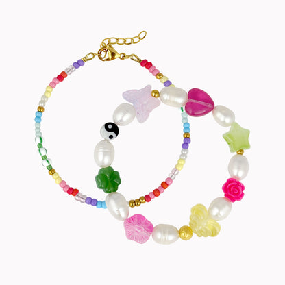 Armbanden set met parels en regenboog kleuren