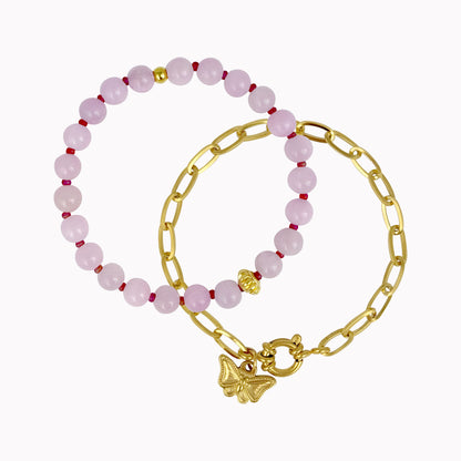 Roze armbanden set met vlinder bedel