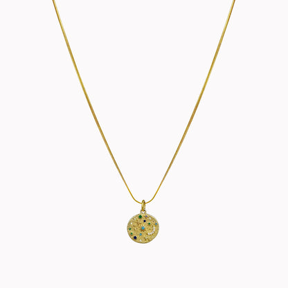 Gouden snake ketting met ronde maan en sterren bedel