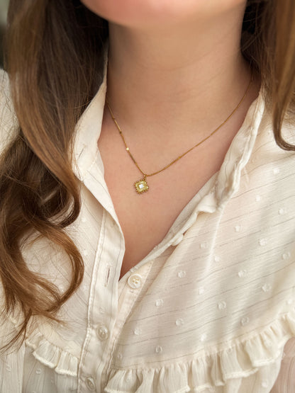 Minimalistische schakelketting met klavertje vier goudkleurig