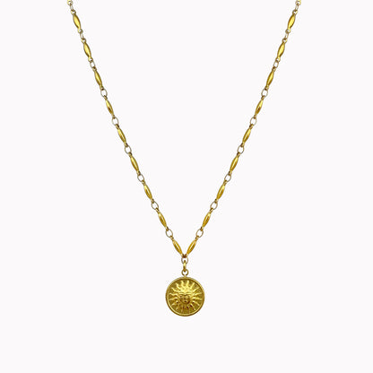 Gouden ketting langwerpige schakels en zon bedel
