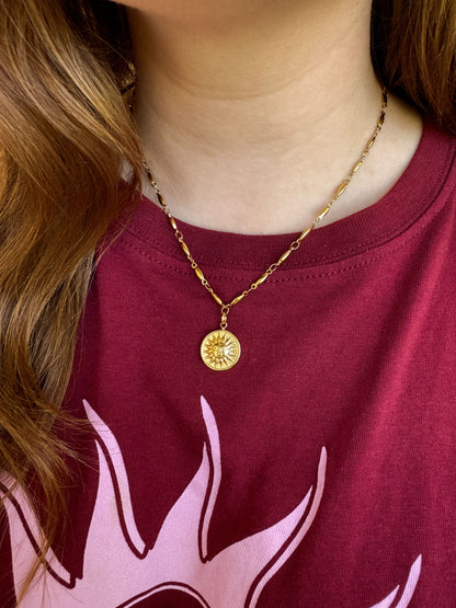Gouden ketting met zon bedel