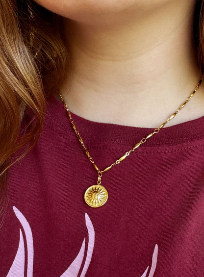Schakelketting met zonbedel goudkleurig