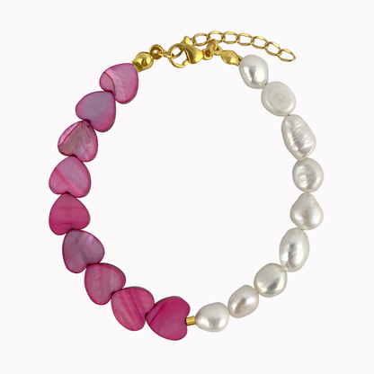 Armband Love More | Parel armband met roze hartjes