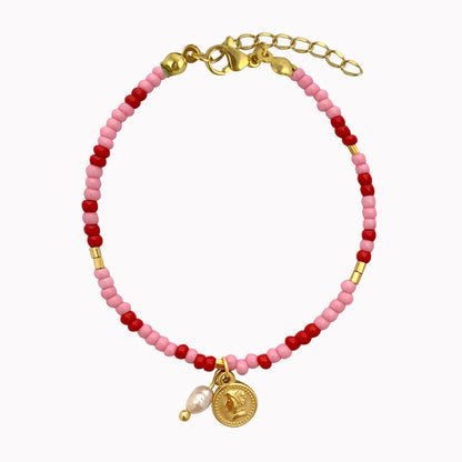 Roze armband met parel en muntje